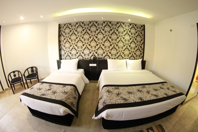 Imagen de la habitación del Hotel Bellagio Beach Resort. Foto 10