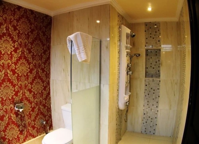 Imagen de la habitación del Hotel Bellagio Beach Resort. Foto 11