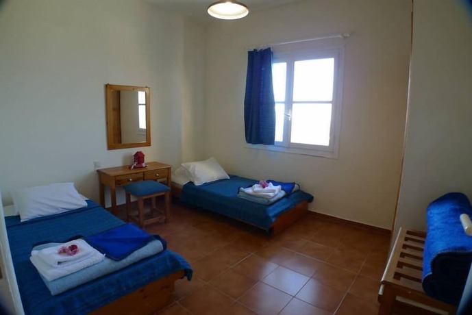 Imagen de la habitación del Hotel Bellair Village. Foto 17