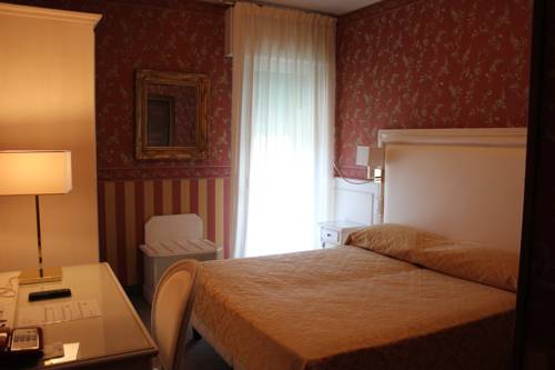 Imagen de la habitación del Hotel Bell'arrivo. Foto 7