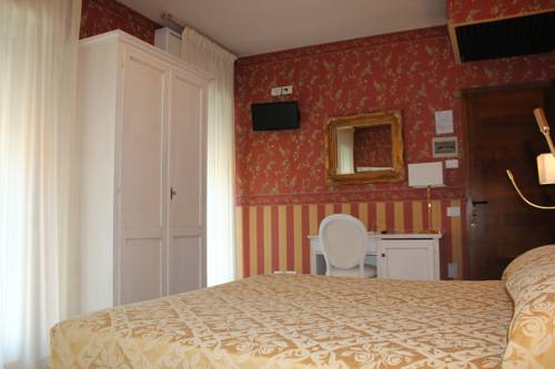 Imagen de la habitación del Hotel Bell'arrivo. Foto 10