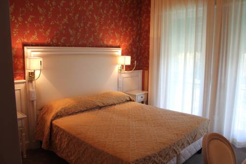 Imagen de la habitación del Hotel Bell'arrivo. Foto 11