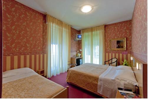 Imagen de la habitación del Hotel Bell'arrivo. Foto 13