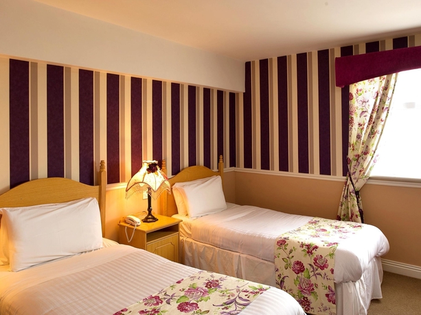 Imagen de la habitación del Hotel Bellbridge House. Foto 14