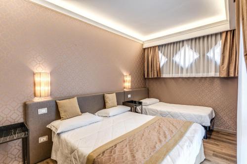 Imagen de la habitación del Hotel Belle Arti. Foto 4