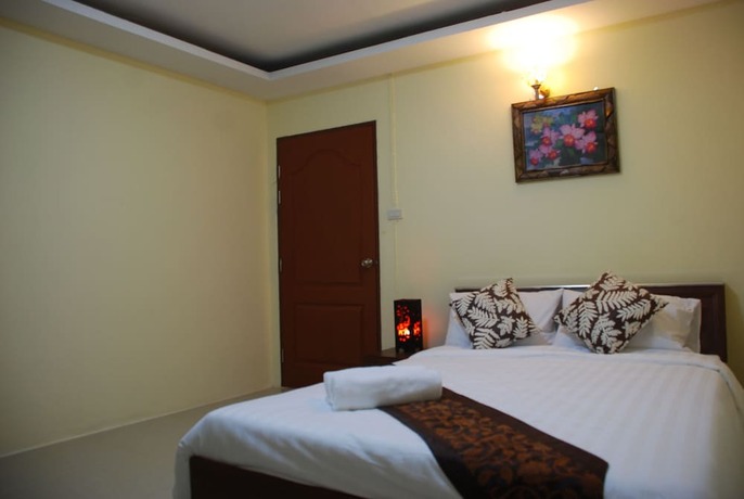 Imagen de la habitación del Hotel Belle Garden. Foto 17