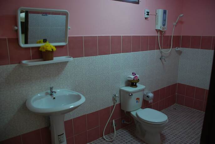 Imagen de la habitación del Hotel Belle Garden. Foto 18