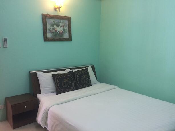 Imagen de la habitación del Hotel Belle Garden. Foto 19