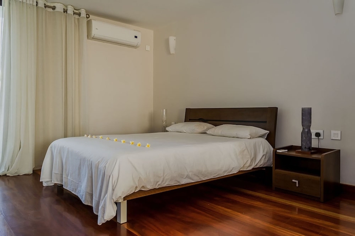 Imagen de la habitación del Hotel Belle Haven Luxury Apartments. Foto 2