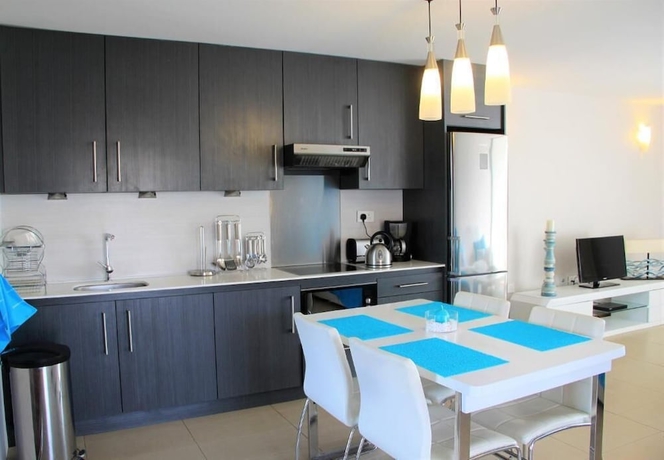 Imagen de la habitación del Hotel Belle Haven Luxury Apartments. Foto 7