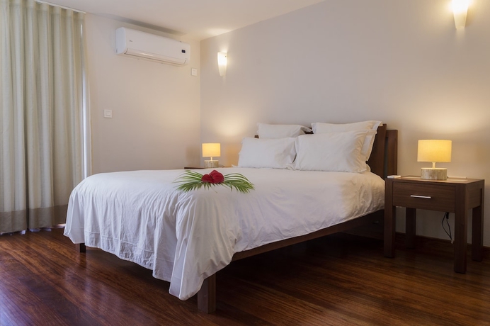 Imagen de la habitación del Hotel Belle Haven Luxury Apartments. Foto 8