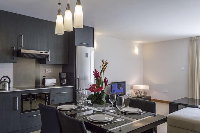 Imagen de la habitación del Hotel Belle Haven Luxury Apartments. Foto 11