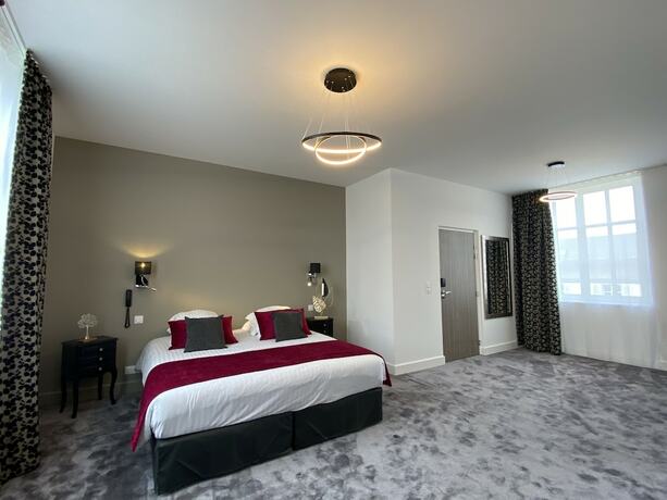 Imagen de la habitación del Hotel Belle Normandy. Foto 11