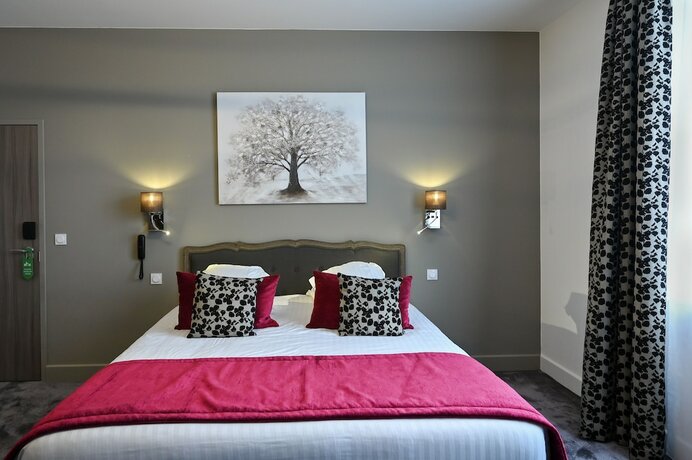 Imagen de la habitación del Hotel Belle Normandy. Foto 16