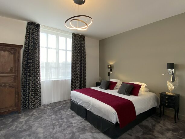 Imagen de la habitación del Hotel Belle Normandy. Foto 20