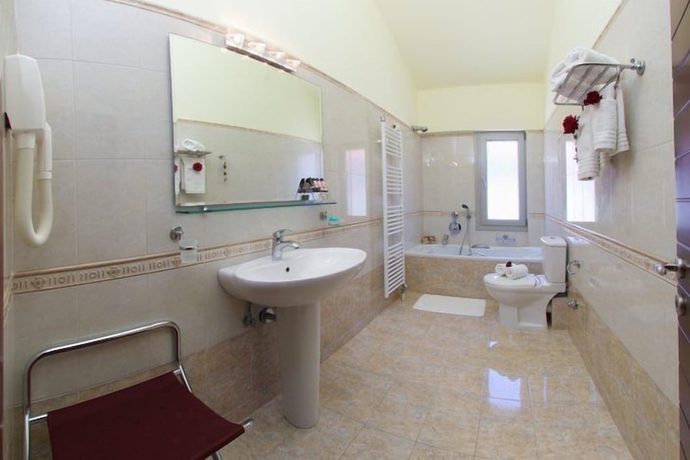 Imagen de la habitación del Hotel Belle View. Foto 17