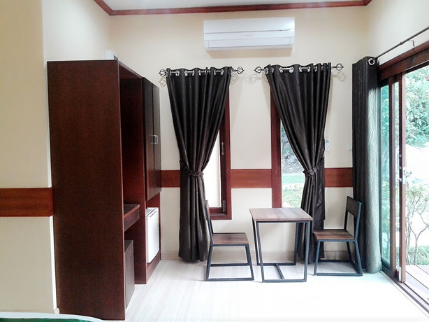 Imagen de la habitación del Hotel Belle Villa Resort Khao Yai. Foto 8