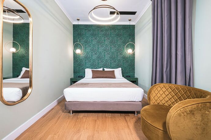 Imagen de la habitación del Hotel Belle epoque suites. Foto 17