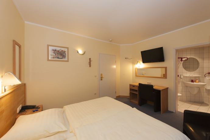 Imagen de la habitación del Hotel Belle-vue. Foto 11