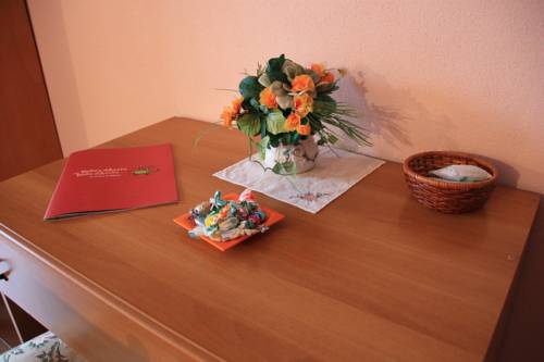 Imagen de la habitación del Hotel Bellevue, Gignod. Foto 12