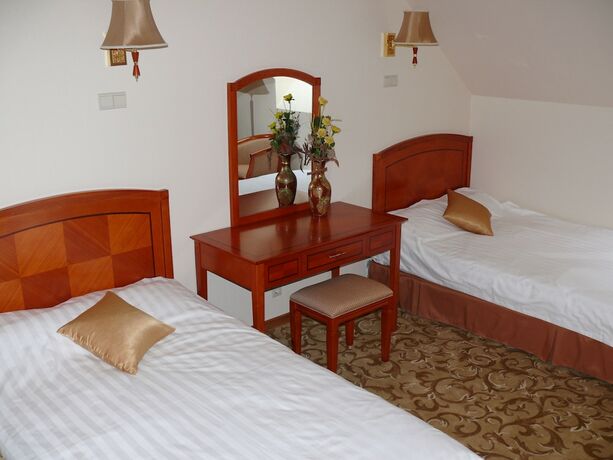 Imagen de la habitación del Hotel Bellevue Konferencia &eacute;s Wellness. Foto 17