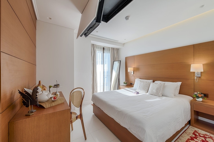 Imagen de la habitación del Hotel Bellevue On The Beach Suites. Foto 18