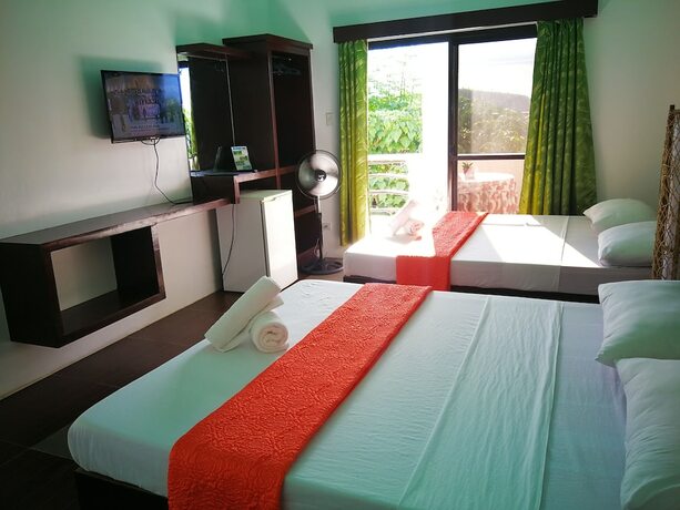 Imagen de la habitación del Hotel Bellevue Resort Puerto Galera. Foto 14