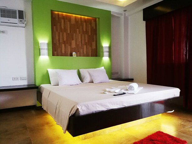 Imagen de la habitación del Hotel Bellevue Resort Puerto Galera. Foto 19