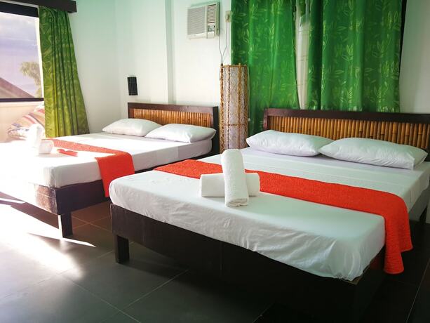 Imagen de la habitación del Hotel Bellevue Resort Puerto Galera. Foto 20