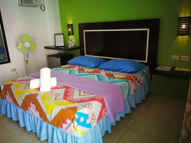 Imagen de la habitación del Hotel Bellevue Resort Puerto Galera. Foto 21