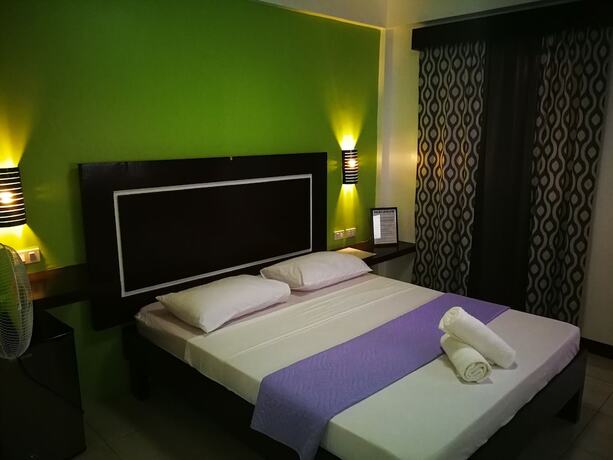 Imagen de la habitación del Hotel Bellevue Resort Puerto Galera. Foto 23