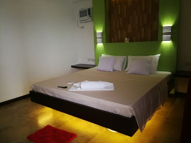 Imagen de la habitación del Hotel Bellevue Resort Puerto Galera. Foto 31