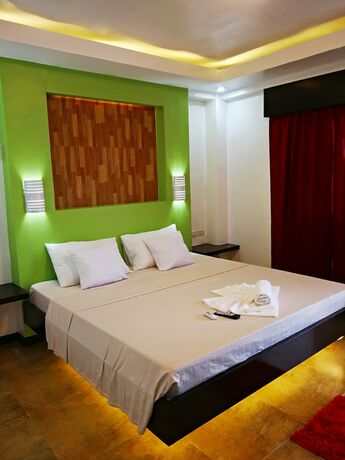 Imagen de la habitación del Hotel Bellevue Resort Puerto Galera. Foto 33