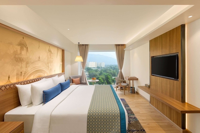 Imagen de la habitación del Hotel Bellevue Sarovar Premiere Junagadh. Foto 5