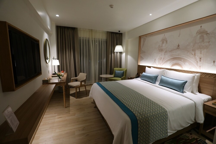 Imagen de la habitación del Hotel Bellevue Sarovar Premiere Junagadh. Foto 11