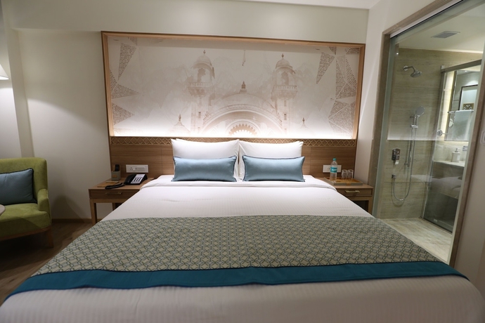 Imagen de la habitación del Hotel Bellevue Sarovar Premiere Junagadh. Foto 12