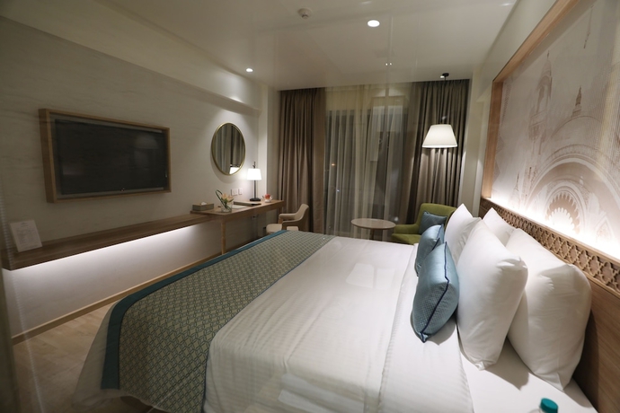 Imagen de la habitación del Hotel Bellevue Sarovar Premiere Junagadh. Foto 13