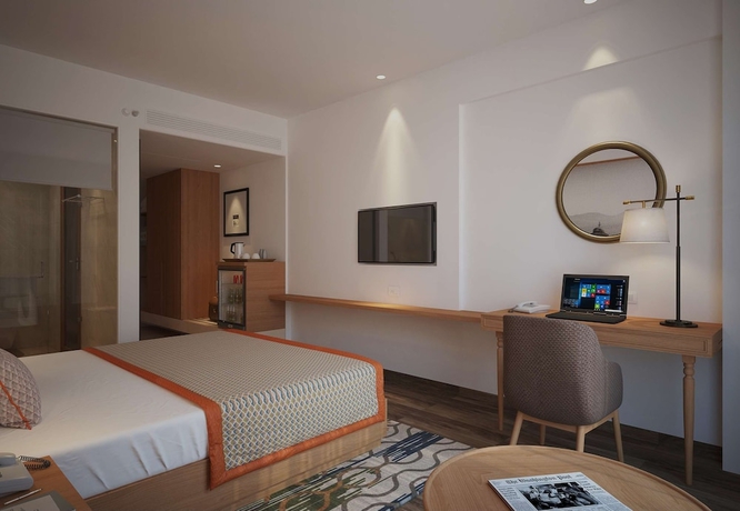 Imagen de la habitación del Hotel Bellevue Sarovar Premiere Junagadh. Foto 15