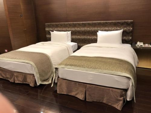 Imagen de la habitación del Hotel Bellezza Taipei. Foto 8