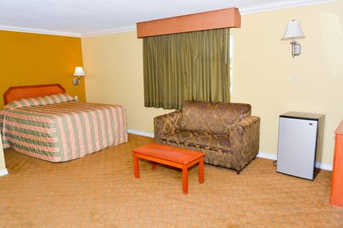 Imagen de la habitación del Hotel Bellflower Travel Inn. Foto 4