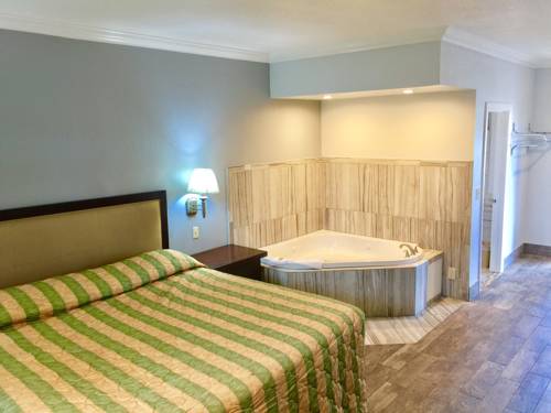 Imagen de la habitación del Hotel Bellflower Travel Inn. Foto 6