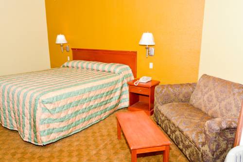 Imagen de la habitación del Hotel Bellflower Travel Inn. Foto 9