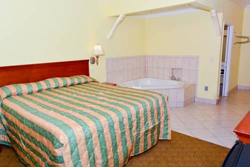 Imagen de la habitación del Hotel Bellflower Travel Inn. Foto 10