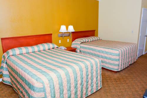 Imagen de la habitación del Hotel Bellflower Travel Inn. Foto 11