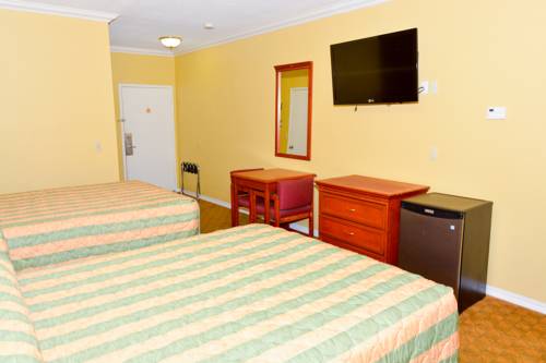 Imagen de la habitación del Hotel Bellflower Travel Inn. Foto 12