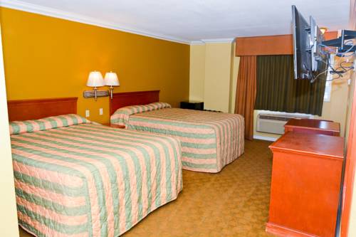 Imagen de la habitación del Hotel Bellflower Travel Inn. Foto 13