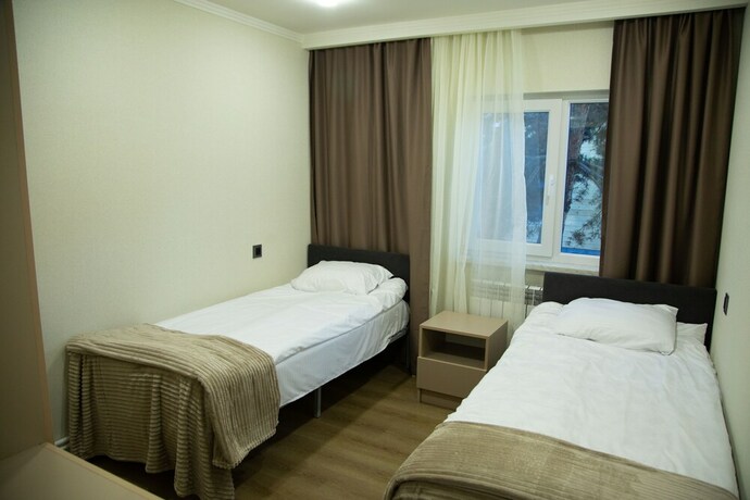 Imagen de la habitación del Hotel Bellissimo Garden Villa. Foto 18