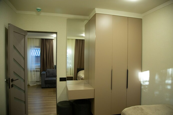 Imagen de la habitación del Hotel Bellissimo Garden Villa. Foto 19