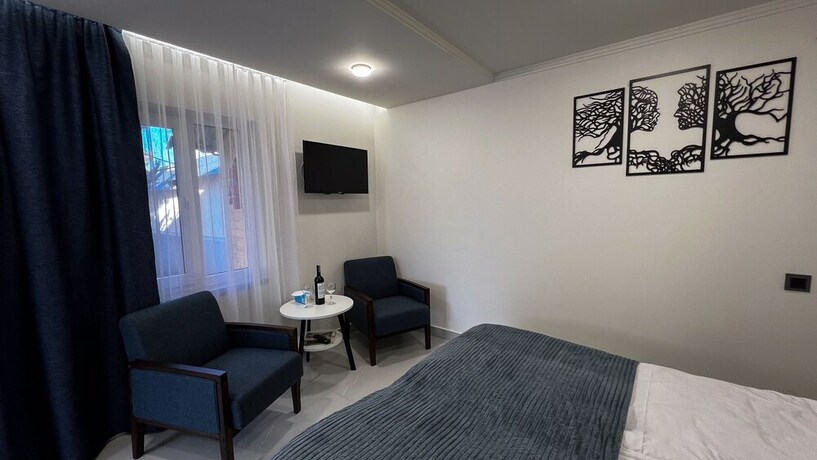 Imagen de la habitación del Hotel Bellissimo Garden Villa. Foto 20