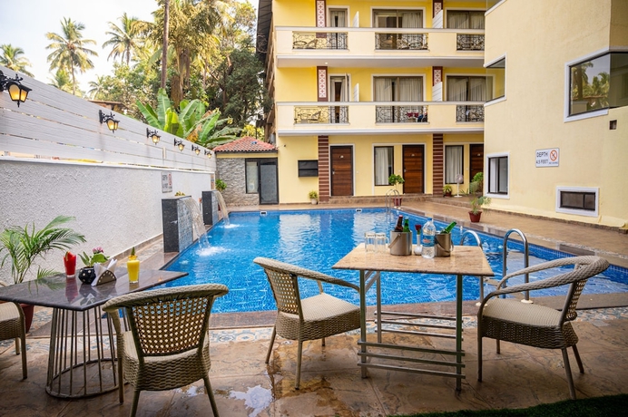 Imagen de la piscina del Hotel Bells Beach Resort Goa. Foto 13